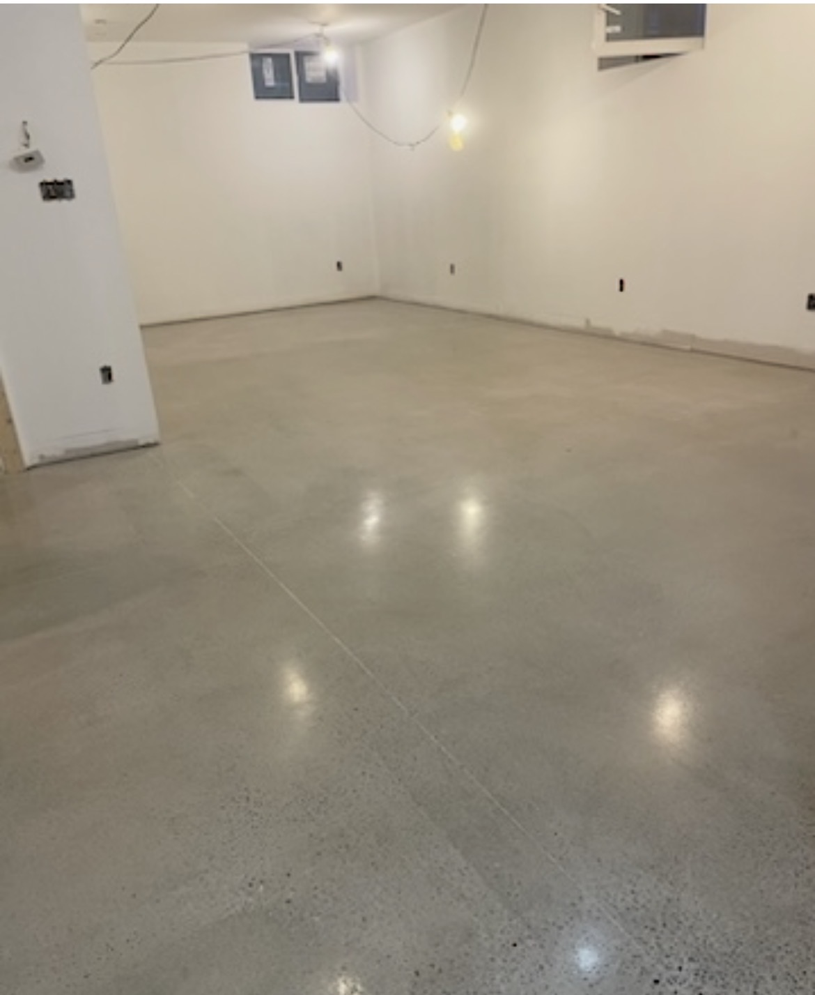 A Scarborough basement slab ground and polished to a satin sheen
